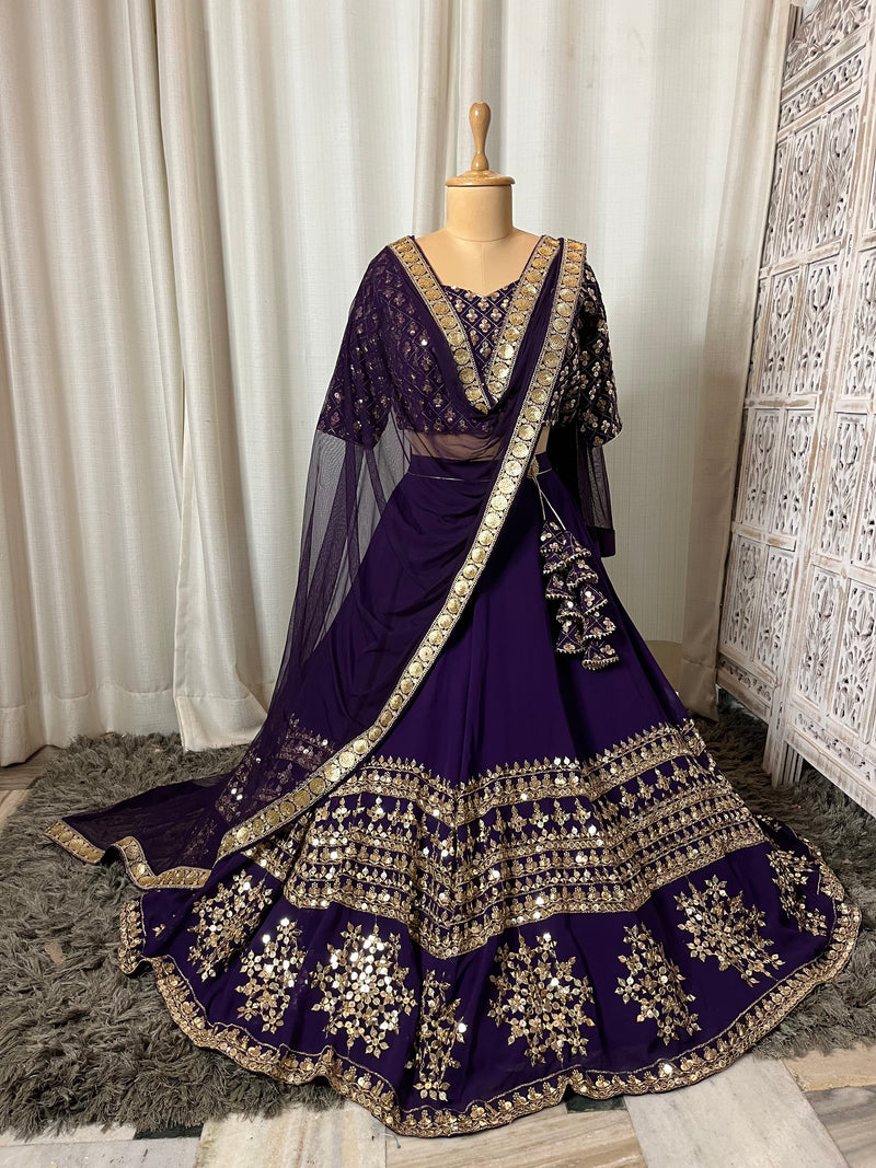 Deep purple and golden lehenga set